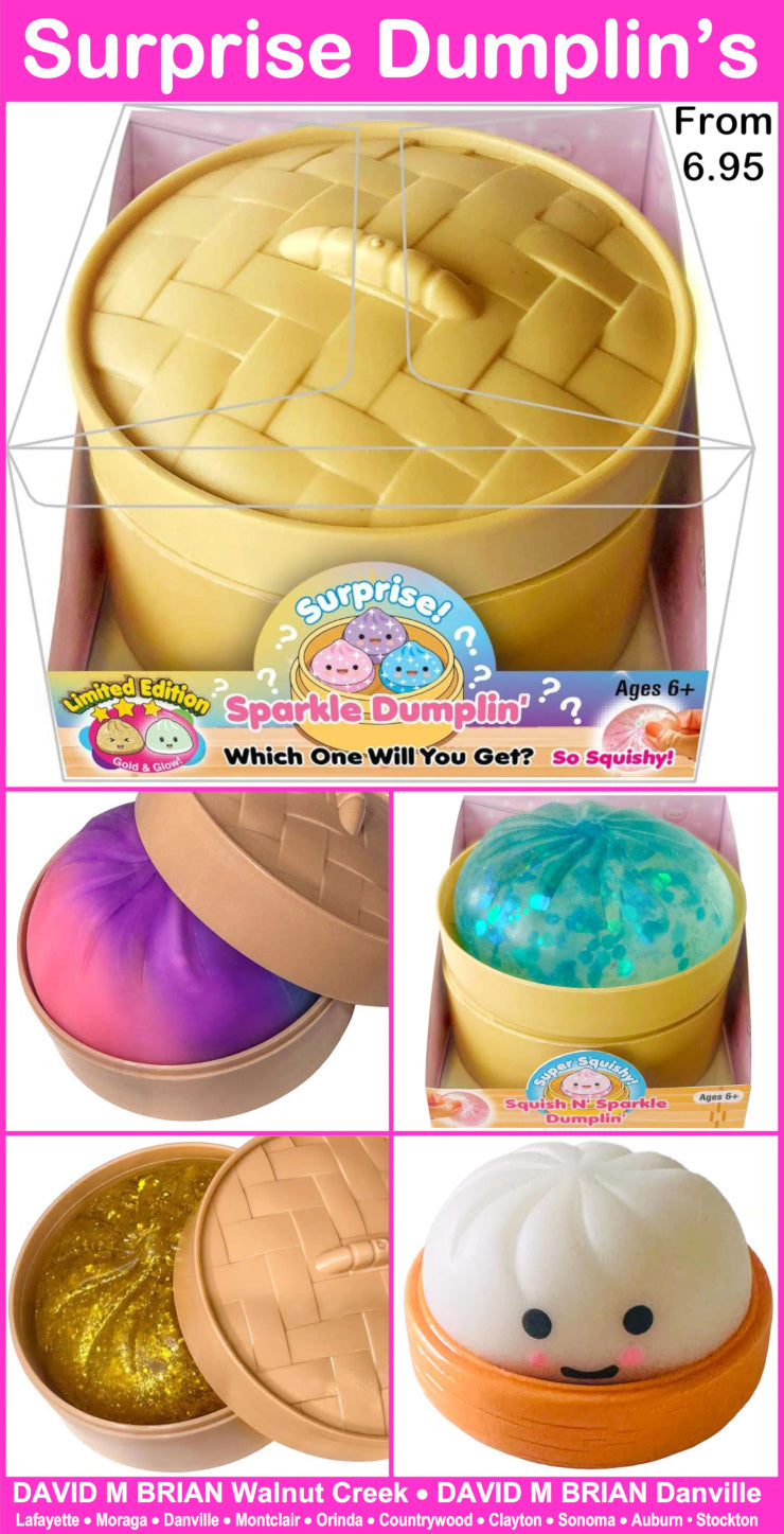 Surprise Dumplin's toy with various colors and a box on a pink background