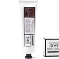 Tube and packaging of Archipelago Botanicals Charcoal Rose Hand Creme on a white background