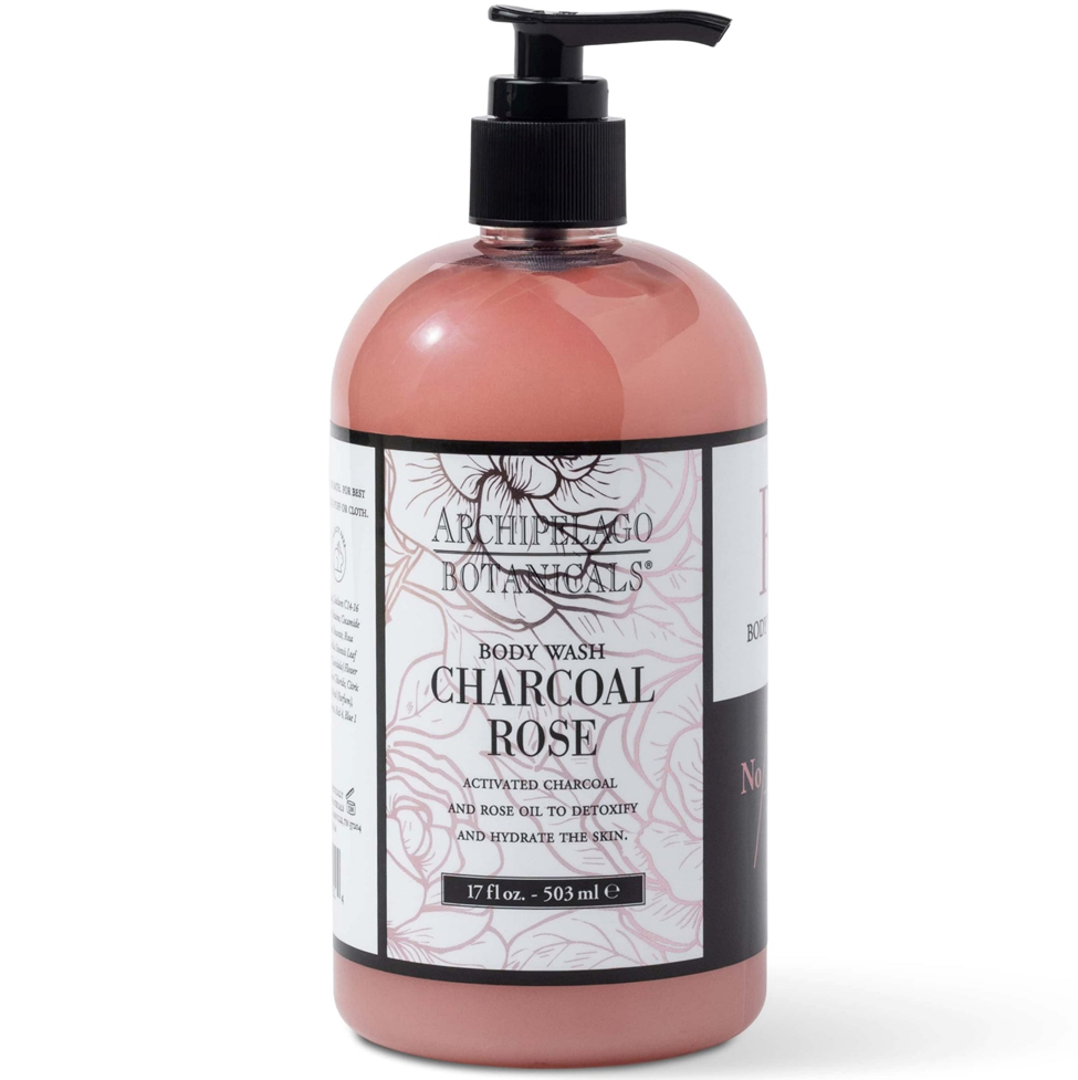 Body wash bottle with charcoal rose scent on a white background