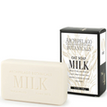 Bar of Archipelago Botanicals Milk soap next to its packaging on a white background