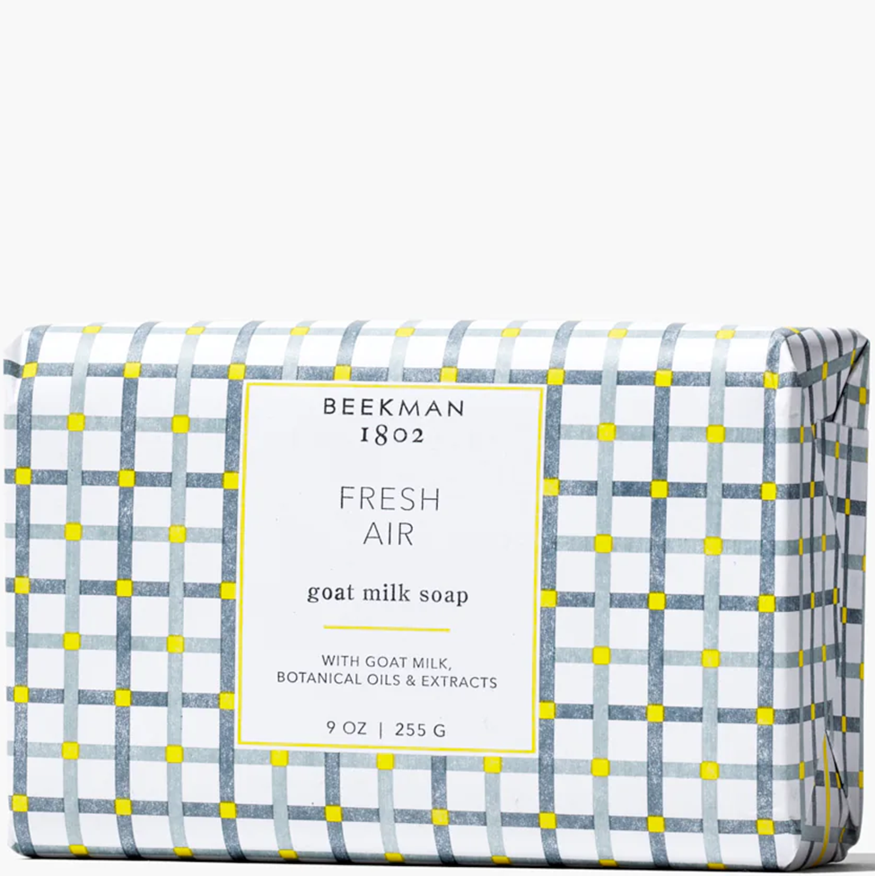 Goat milk soap bar with plaid design and 'Beeckman 1802' branding on a white background