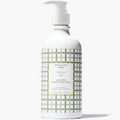 Bottle of Beekman 1802 Fresh Air goat milk hand & body wash on a white background