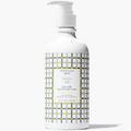 Bottle of Beekman 1802 Fresh Air goat milk hand & body wash on a white background