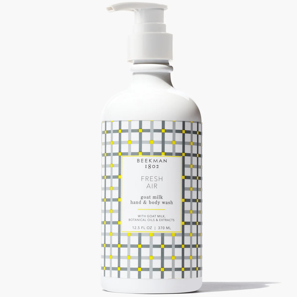 Bottle of Beekman 1802 Fresh Air goat milk hand & body wash on a white background