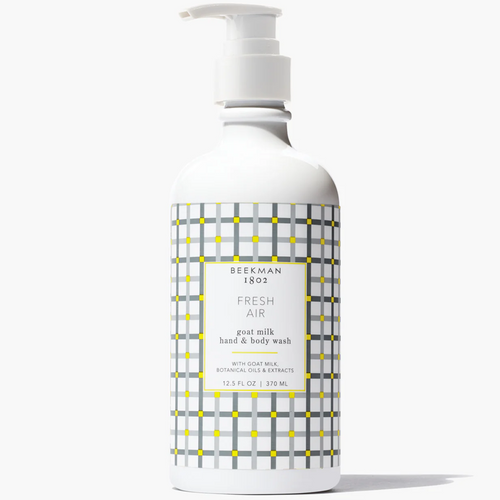 Bottle of Beekman 1802 Fresh Air goat milk hand & body wash on a white background
