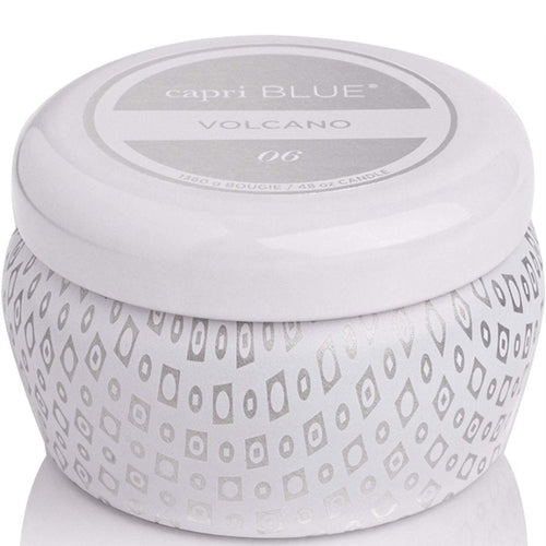 Capri Blue candle with patterned design and 'Volcano' label on a white background