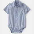 Blue denim-style baby onesie with button details on a white background