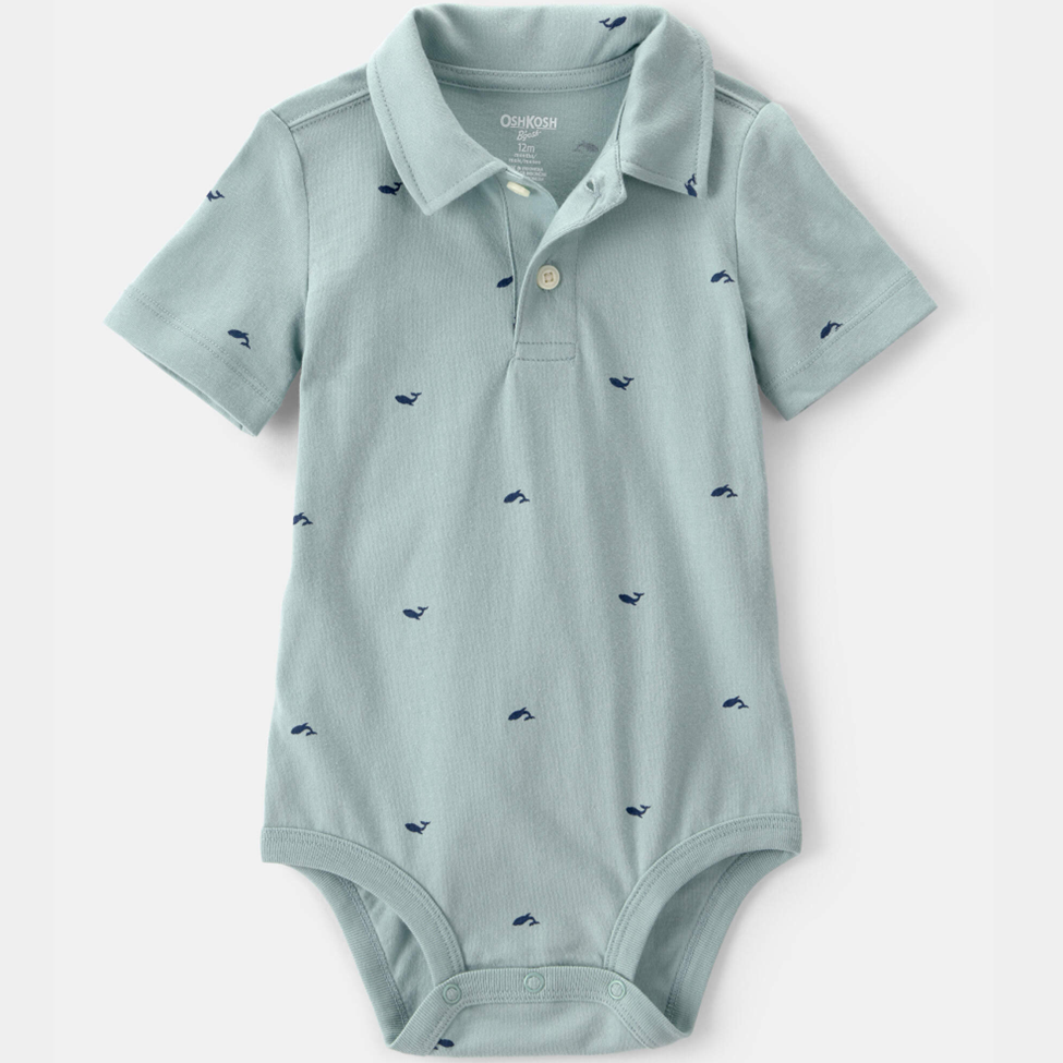 Light blue baby onesie with whale pattern on a white background