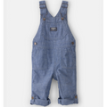 Blue denim overalls on a white background