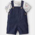 Children's outfit with denim overalls and a patterned shirt on a white background