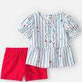 Striped shirt with floral details and red shorts on a white background