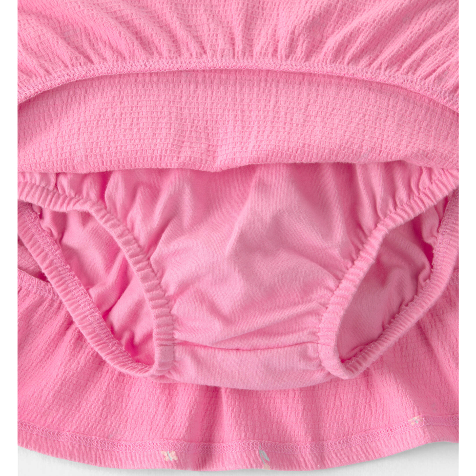 Close-up of pink underwear with a white background