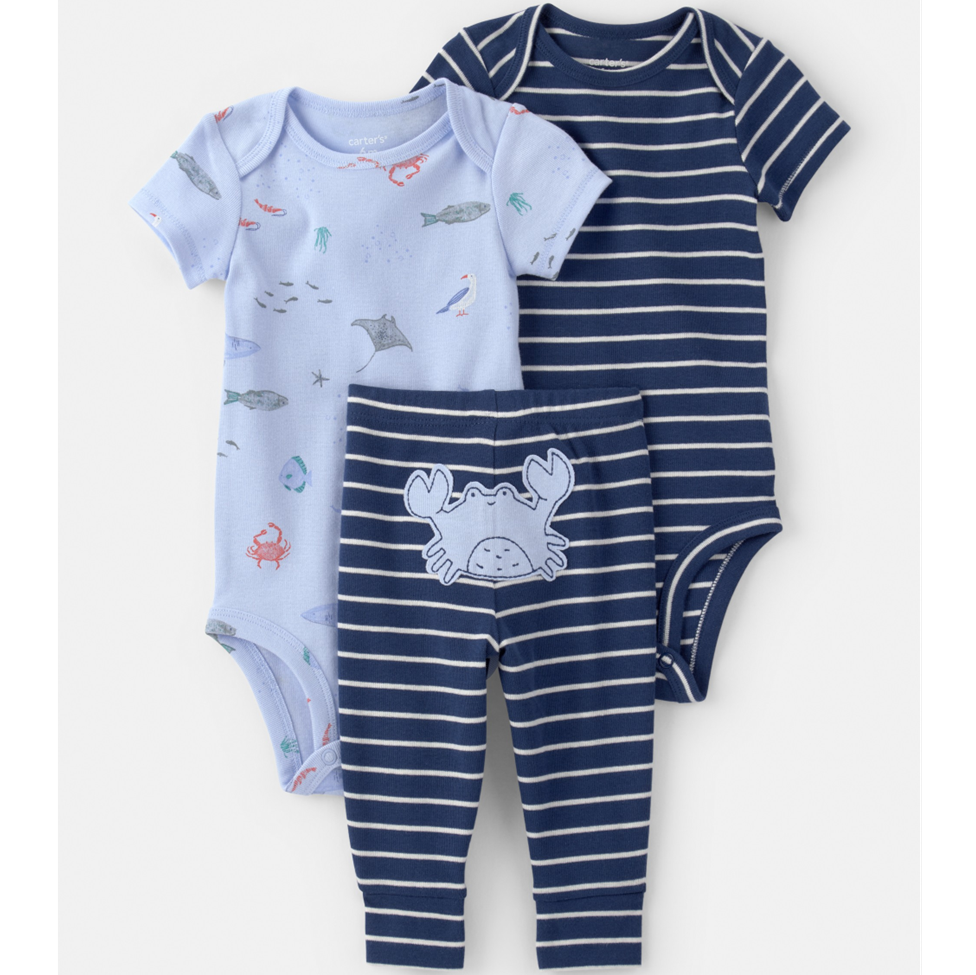 Set of baby clothing including a blue onesie with animal prints and navy striped pants on a white background.