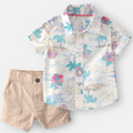Children's outfit with floral shirt and beige shorts on a white background