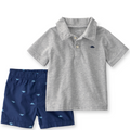 Gray polo shirt and navy shorts with fish pattern on a white background