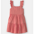 Pink dress with ruffled straps on a white background