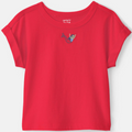 Red t-shirt with a small graphic on a white background