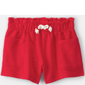 Red shorts with white floral embroidery on a white background