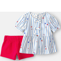 Striped shirt with floral details and red shorts on a white background