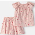 Pink children's pajama set with strawberry pattern on a white background
