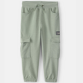 Green cargo jogger pants with a brand label on a white background