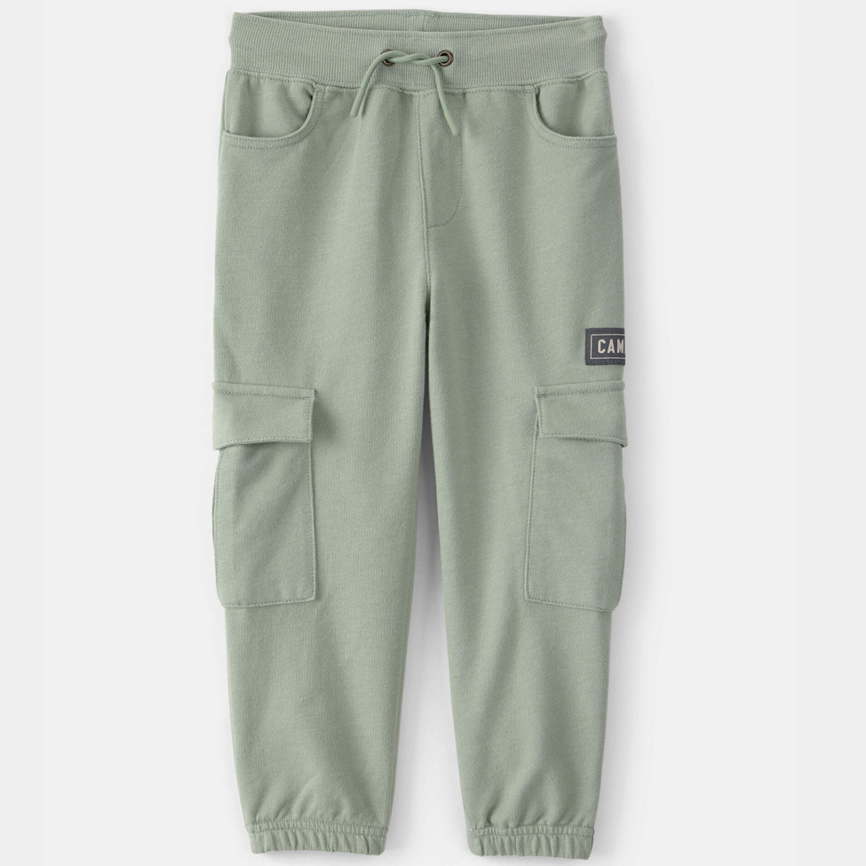 Green cargo jogger pants with a brand label on a white background