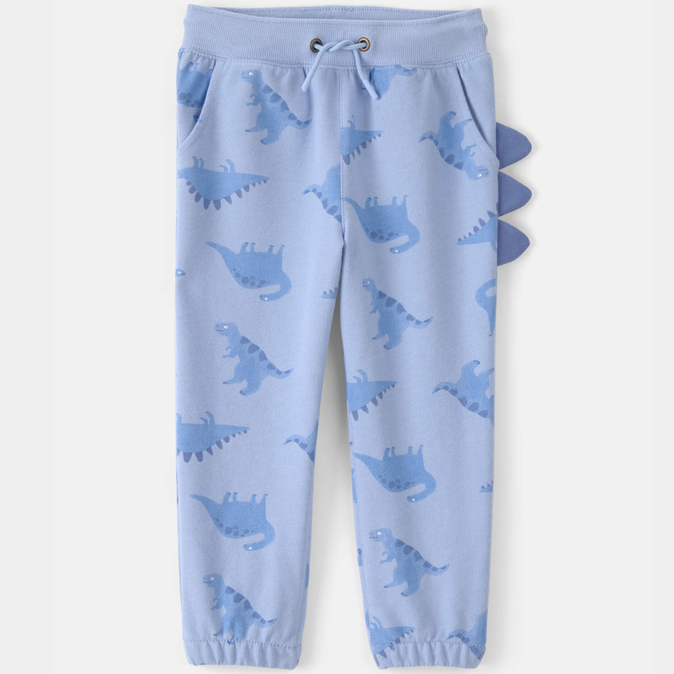 Blue children's sweatpants with dinosaur pattern on a white background