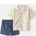 Children's outfit with a patterned shirt and navy shorts on a white background