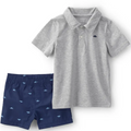 Gray polo shirt and navy shorts with fish pattern on a white background