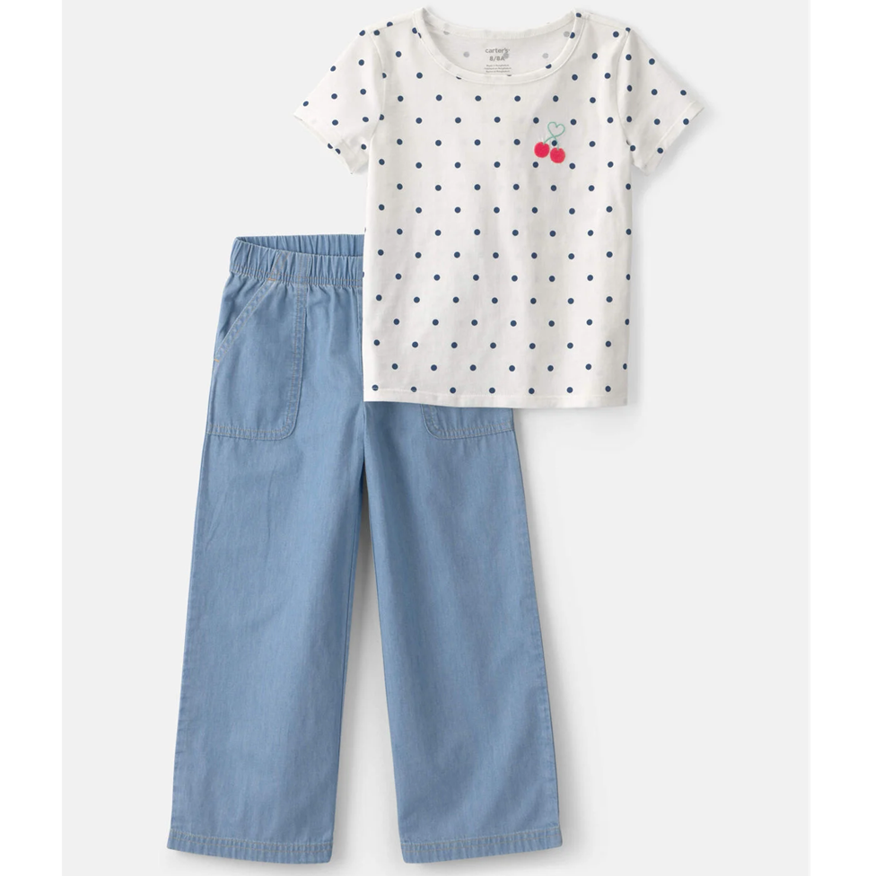 Children's outfit with polka dot shirt and blue pants on a white background