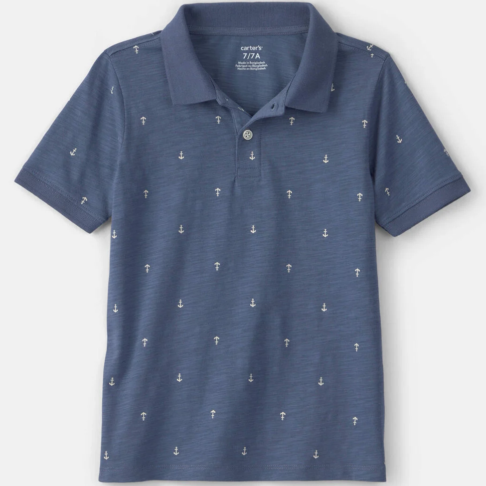 Blue polo shirt with anchor pattern on a white background