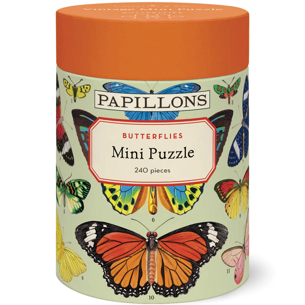 Papillons butterflies mini puzzle packaging with colorful butterfly illustrations on a light green background.