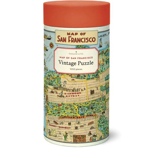 Cylindrical puzzle box with a map design and red lid on a white background