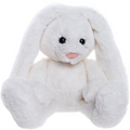 White plush bunny toy on a white background