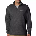 Man wearing a Columbia branded gray pullover on a white background