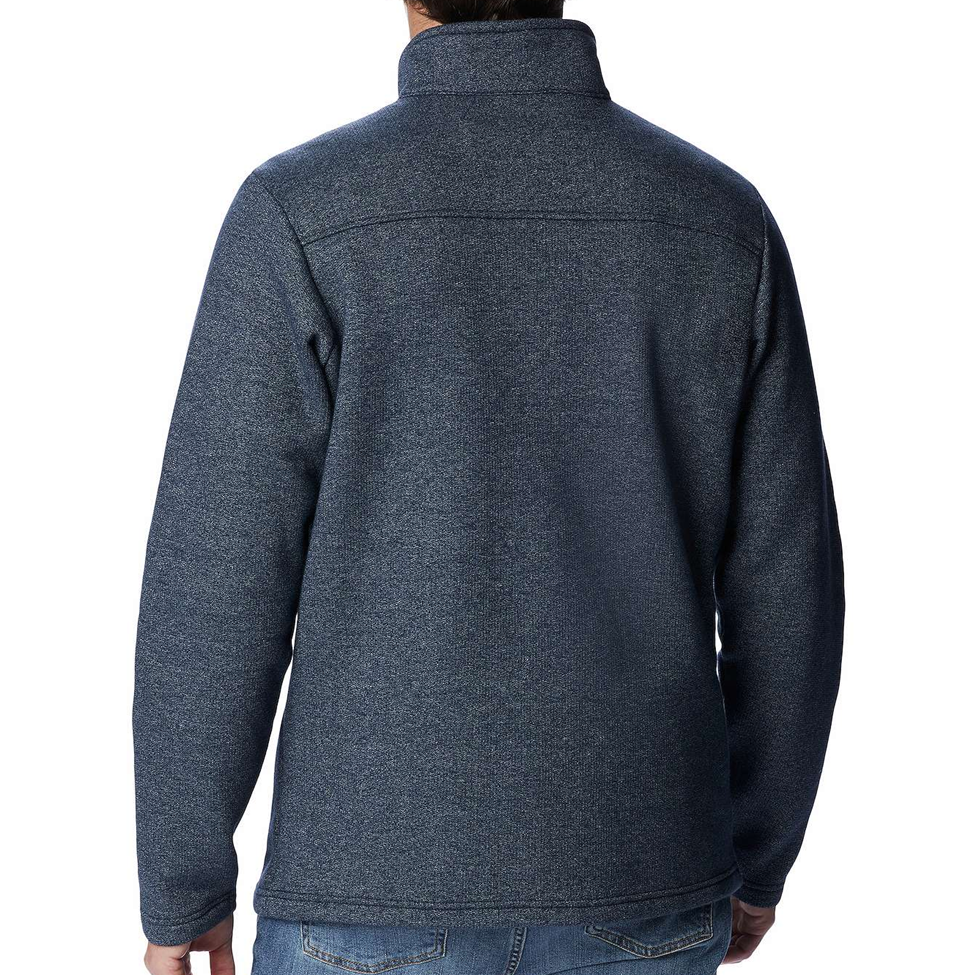 Back view of a person wearing a dark blue fleece jacket on a white background