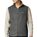 Person wearing a gray Columbia vest over a beige shirt on a white background