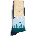 Sock with nature design and 'Conscious Step' packaging on a white background
