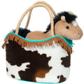 Plush horse toy inside a cow print bag with turquoise trim on a white background