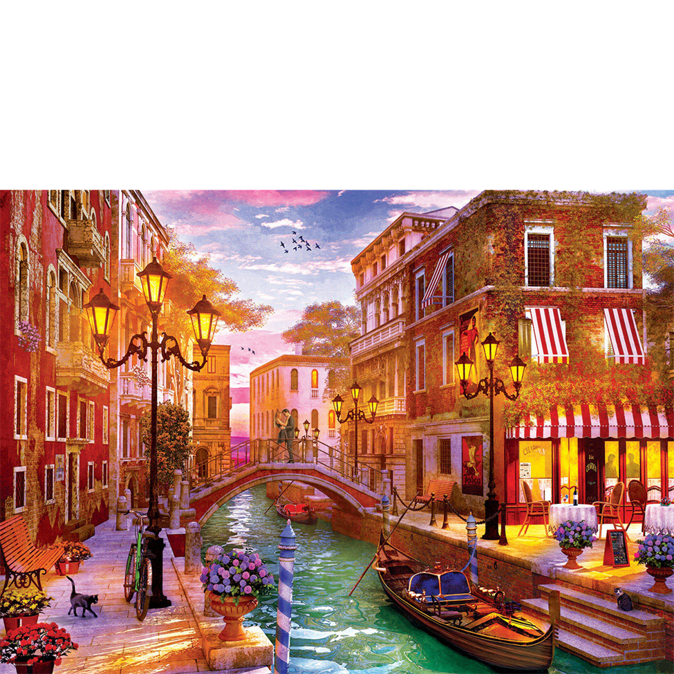 Colorful Italian street scene with canal, buildings, and street lamps.