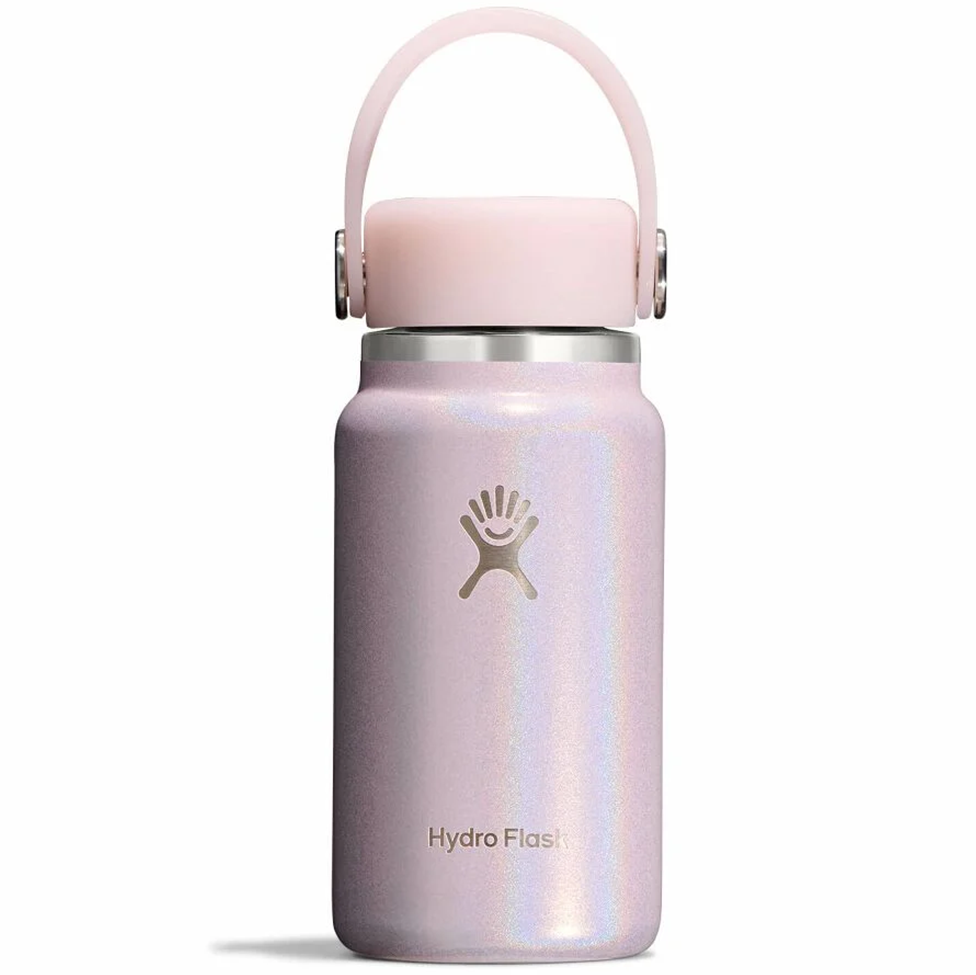 Pink Hydro Flask water bottle with a handle on a white background