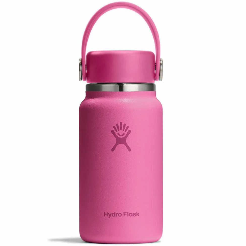 Pink Hydro Flask water bottle with a silver lid on a white background