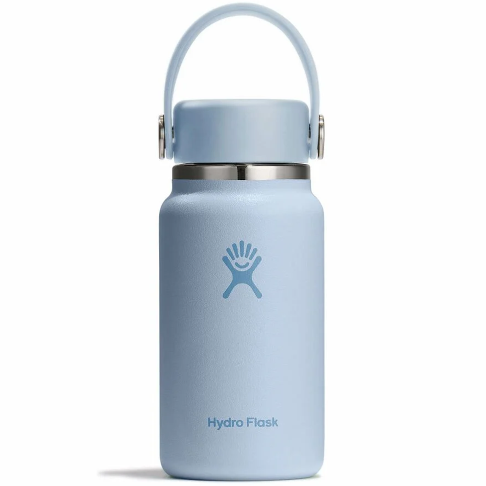 Light blue Hydro Flask water bottle with a handle on a white background