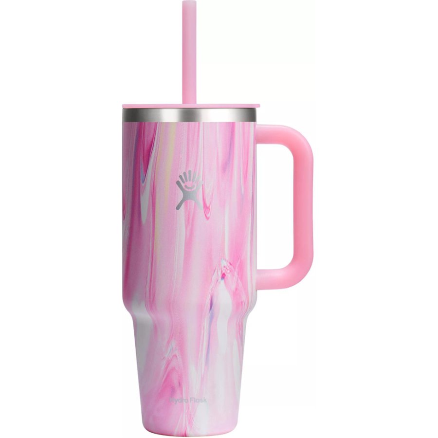 Pink marbled tumbler with handle and straw on a white background