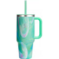 Colorful marbled tumbler with handle and straw on a white background