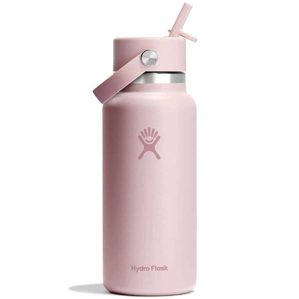 Pink Hydro Flask water bottle with straw lid on a white background