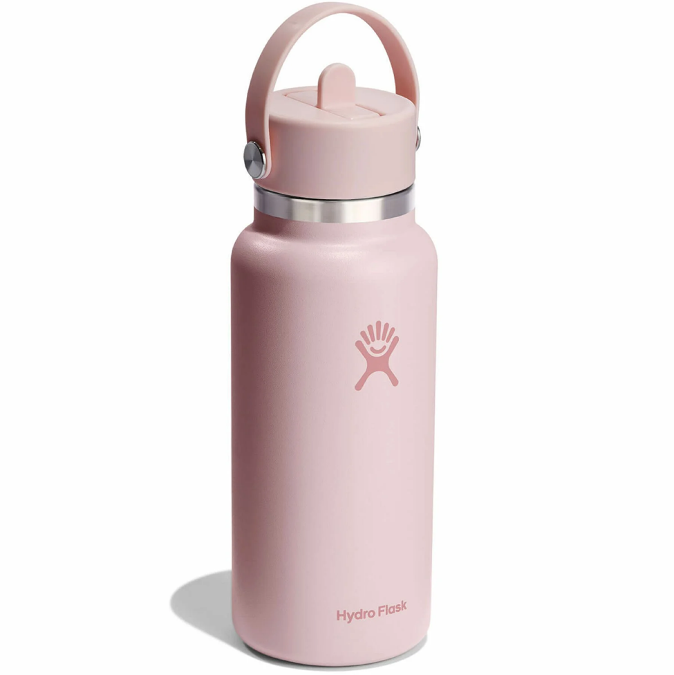 Pink Hydro Flask water bottle with a handle on a white background
