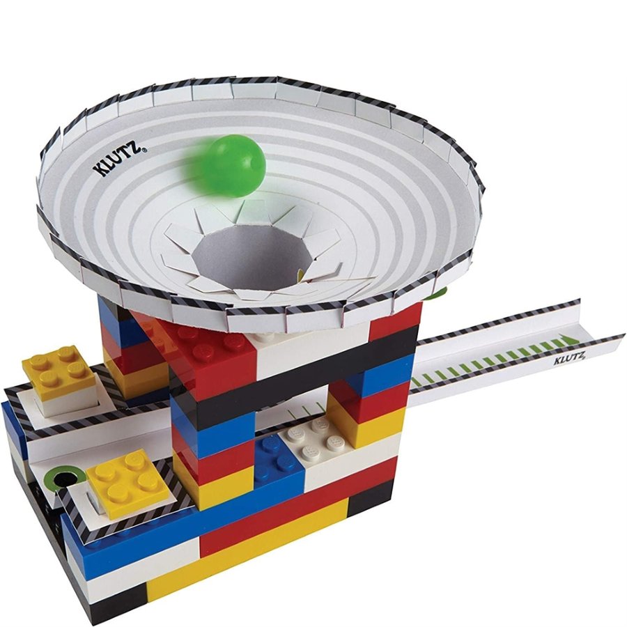 Colorful building block set with a green ball on a white background