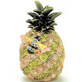Decorative pineapple figurine with a bee and crystals on a white background