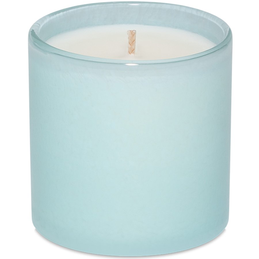 Candle in a light blue glass container on a white background